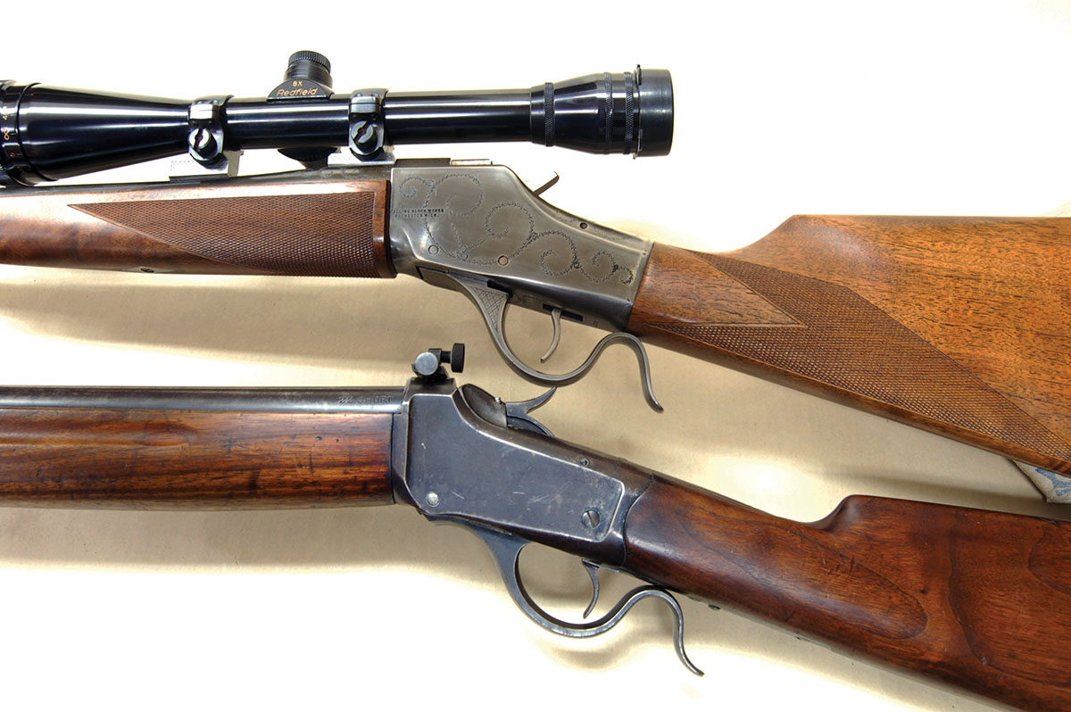 The FBW Model J action (top) is styled after the Winchester High Wall. The bottom rifle is a Winchester Low Wall.